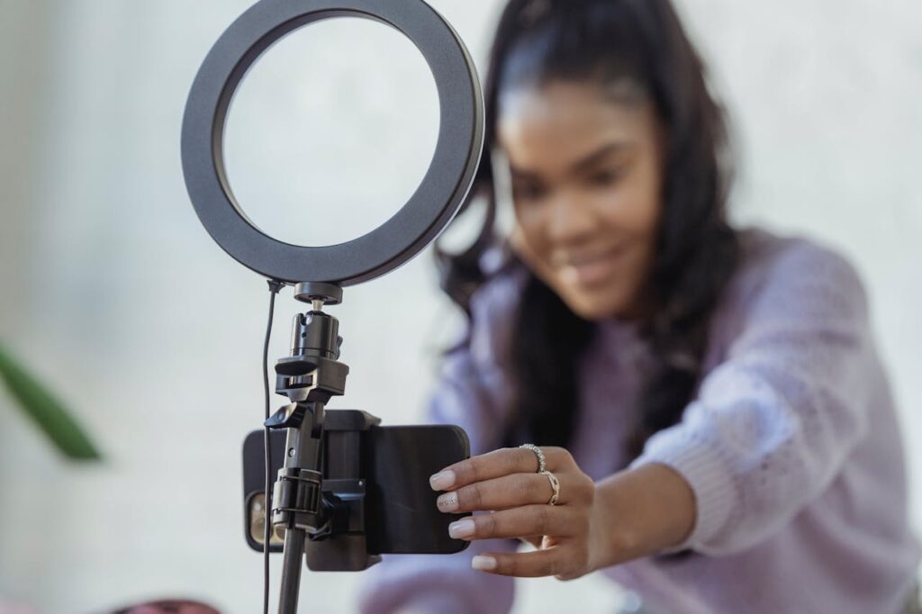 Small Business Owner Setting Up Video Equipment for Marketing